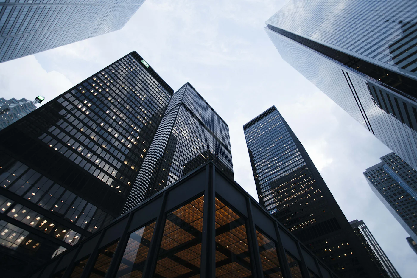 Glass office towers seen from street level
