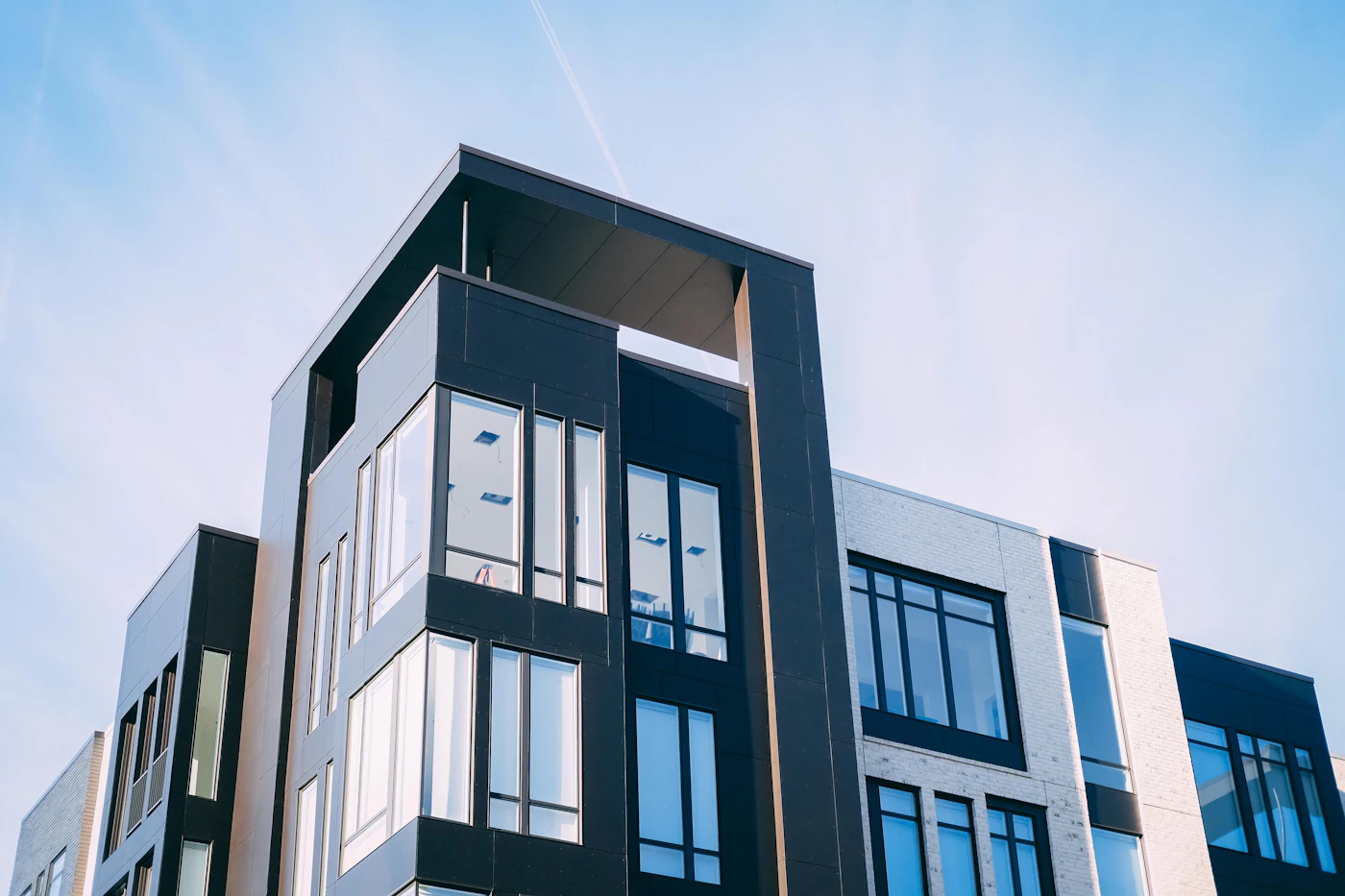 Modern apartment building against a clear sky